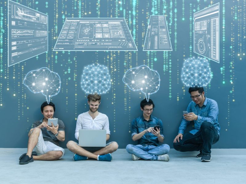 Group Of Asian and Multiethnic Business people working with brai Group Of Asian and Multiethnic Business people working with brain and virtual screen